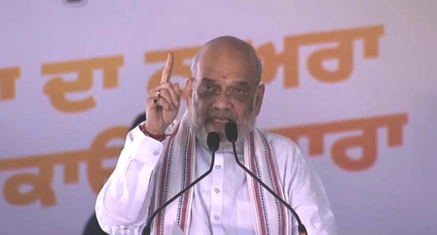 अमित शाह ने दोहराया संकल्प, आप सरकार को लिया निशाने पर, प्रभावित परिवारों का जिक्र