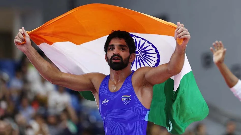 क्रिकेट, गोल्फ और तीरंदाजी के बाद अमन ने जीता गोल्ड, फाइनल में वर्ल्ड चैंपियन को दी पटखनी